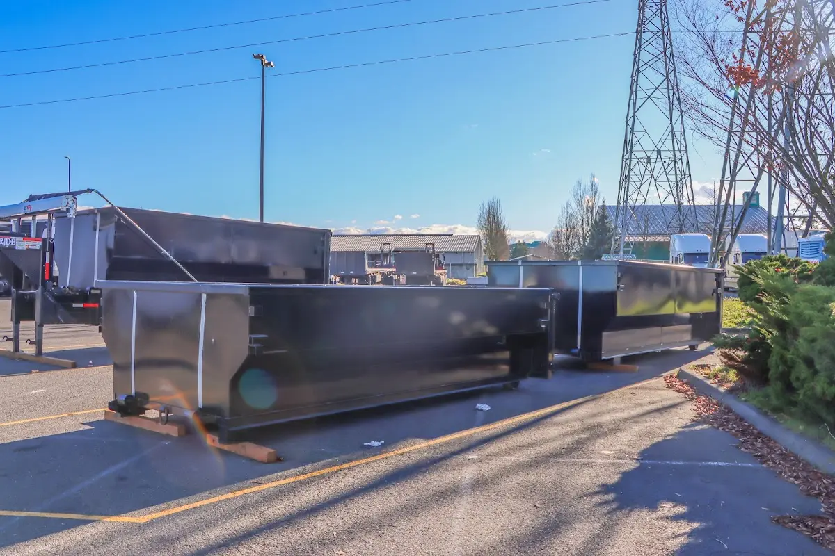Roll-off dumpster ready for waste disposal at job site for Demolition Dumpster Rental in Skowhegan